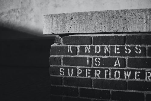 A brick wall reading